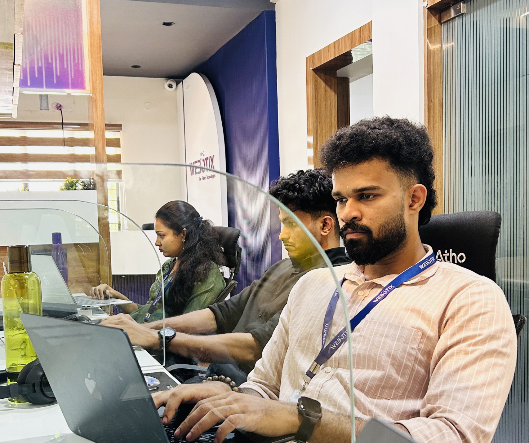 webotix employees on a team meeting